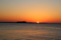 LaFerte - Battery at dawn with container ship